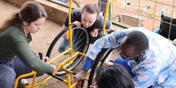Volunteers assembling custom assistive equipment – Wings Aloft in Broken Arrow, Oklahoma